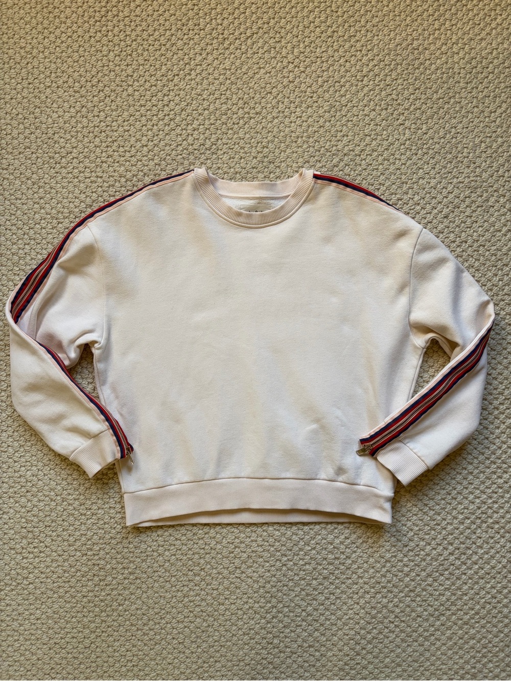 ba&sh Pale Peach Crewneck Sweatshirt with Red and Navy Sleeve Stripes